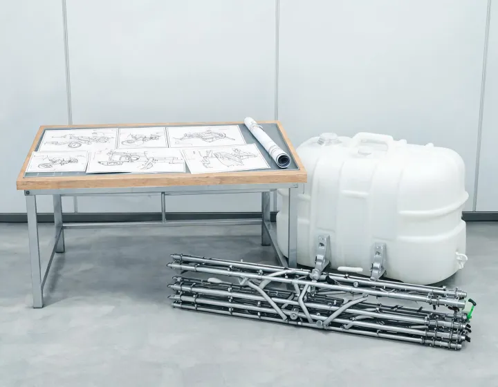 Sprayer specification discussion at an equipment yard